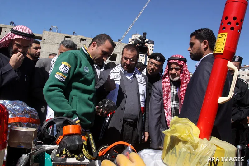 Palestinian civil defense members stage a mock rescue operation during a training exercise marking the International Civil Defense Day in Gaza city on March 2,2011 . Photo by Mohammed Asad