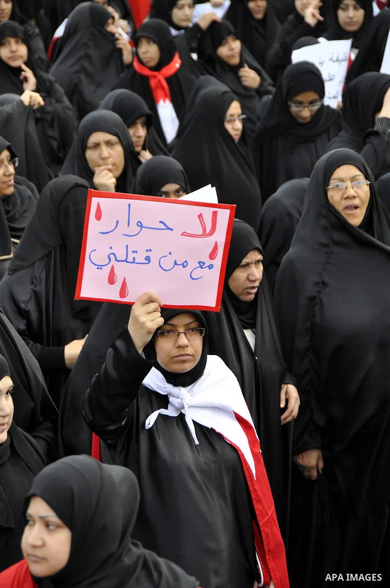 Protesters demonstrate in front of the Interior Ministry in Manama, capital of Bahrain, March 2, 2011. Anti-government protesters turned up in hundreds here on Wednesday, calling for the release of remaining political pr...