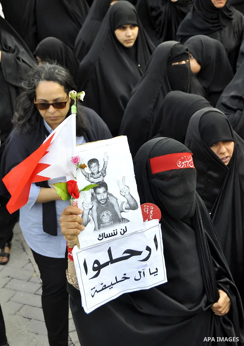 Protesters demonstrate in front of the Interior Ministry in Manama, capital of Bahrain, March 2, 2011. Anti-government protesters turned up in hundreds here on Wednesday, calling for the release of remaining political pr...