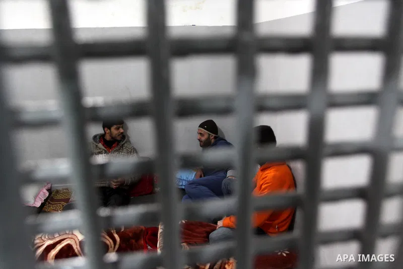 Palestinian prisoners are seen at the new department for prisoners at a police station during the opening ceremony, in Gaza City on March 3, 2011. Photo by Mohammed Asad