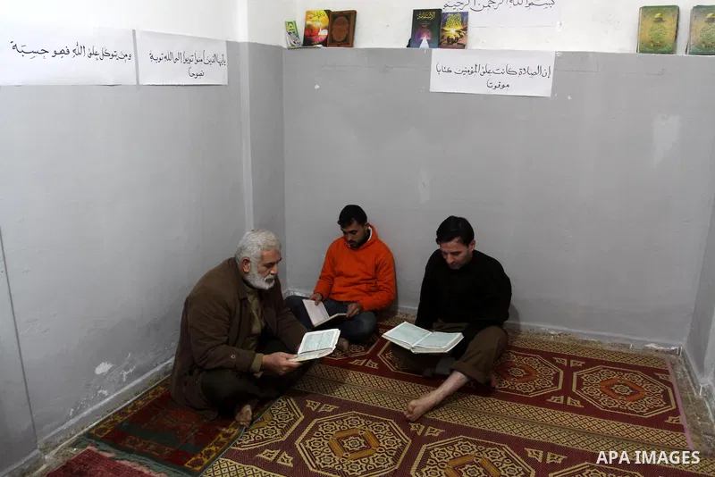 Palestinian prisoners are seen at the new department for prisoners at a police station during the opening ceremony, in Gaza City on March 3, 2011. Photo by Mohammed Asad
