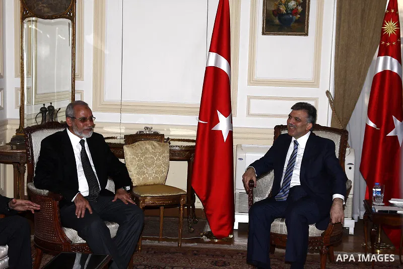 Turkish President Abdullah Gul, right, meets with Muslim Brotherhood leader Mohammed Badie in Cairo, Egypt, Thursday, March 3, 2011. Photo by Ahmed Asad