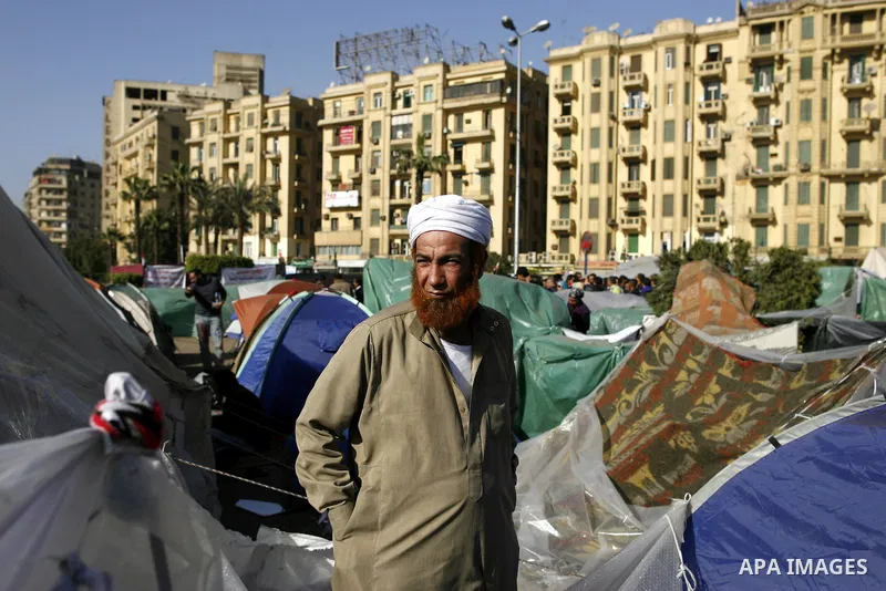 Egyptian protesters take part in a demonstration at the Tahrir square in Cairo, Egypt, Thuresday, March 3, 2011. hundreds of protesters are camping at the Tahrir square in an ongoing campaign demanding the resignation of...