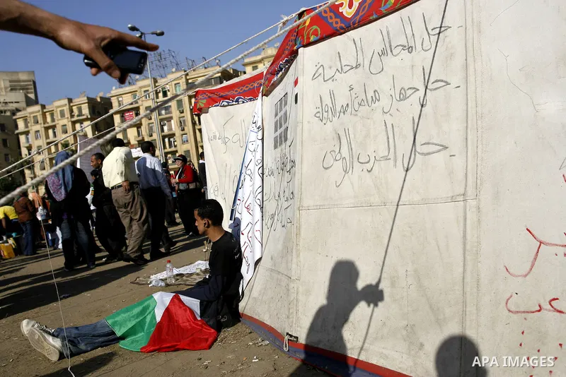 Egyptian protesters take part in a demonstration at the Tahrir square in Cairo, Egypt, Thuresday, March 3, 2011. hundreds of protesters are camping at the Tahrir square in an ongoing campaign demanding the resignation of...