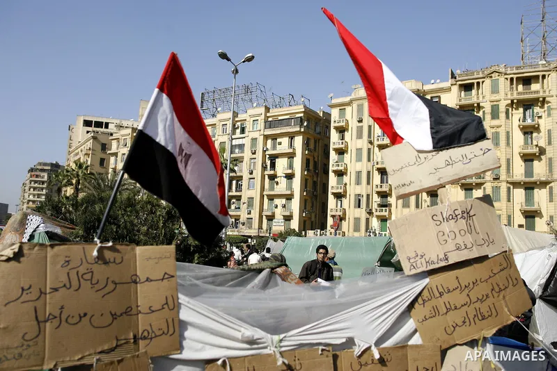 Egyptian protesters take part a demonstration at the Tahrir square in Cairo, Egypt, Thuresday, March 3, 2011. hundreds of protesters are camping at the Tahrir square in an ongoing campaign demanding the resignation of th...