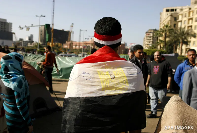 Egyptian protesters take part in a demonstration at the Tahrir square in Cairo, Egypt, Thuresday, March 3, 2011. hundreds of protesters are camping at the Tahrir square in an ongoing campaign demanding the resignation of...