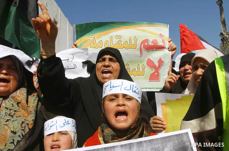 Palestinian Hamas supporters attend a Hamas rally in Gaza city, which called for an end to Palestinian divisions, March 4, 2011. Photo by Ashraf Amra