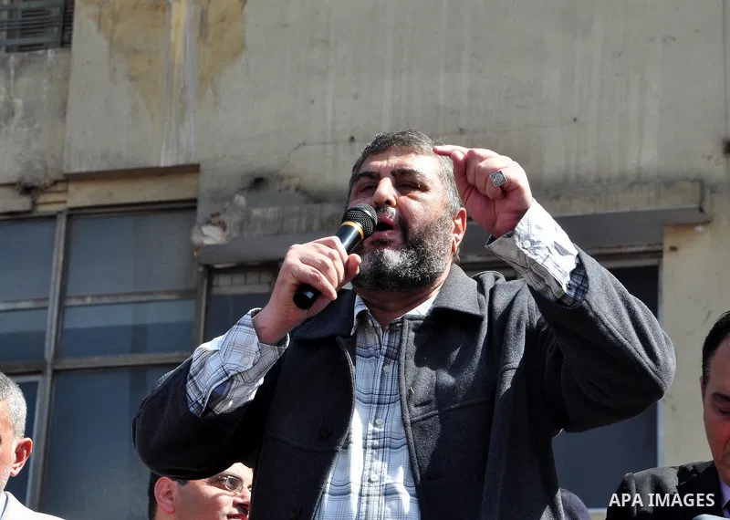 Khayrat el-Shater, the lead strategist for Egypt's largest opposition group, speaks to demonstrators at Tahrir Square in Cairo, Egypt, Friday, March 4, 2011. Egypt's new prime minister designate has vowed before thousand...