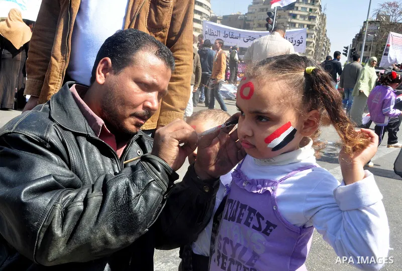 Demonstrators take part in a protest at Tahrir Square in Cairo, Egypt, Friday, March 4, 2011. Egypt's new prime minister designate has vowed before thousands of mostly young demonstrators at a central Cairo square that h...