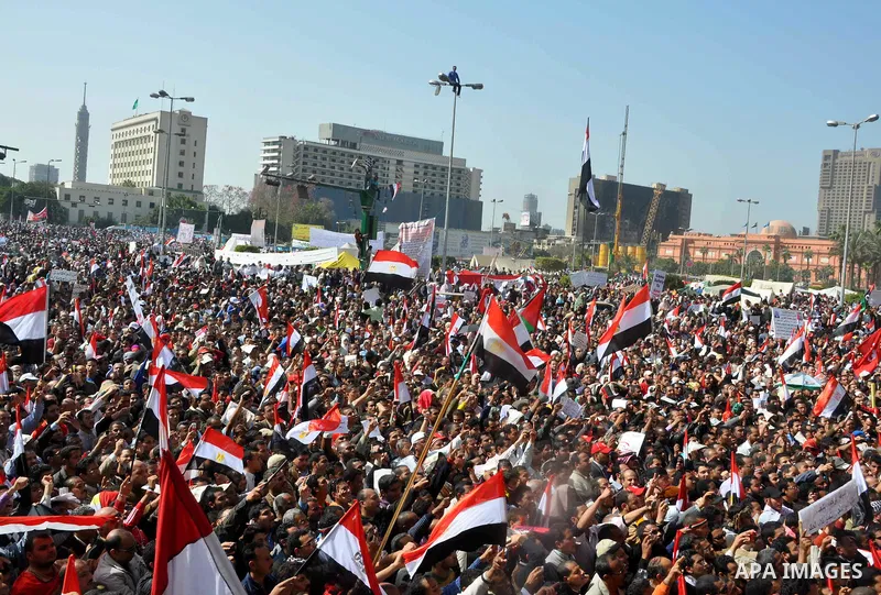 Demonstrators take part in a protest at Tahrir Square in Cairo, Egypt, Friday, March 4, 2011. Egypt's new prime minister designate has vowed before thousands of mostly young demonstrators at a central Cairo square that h...