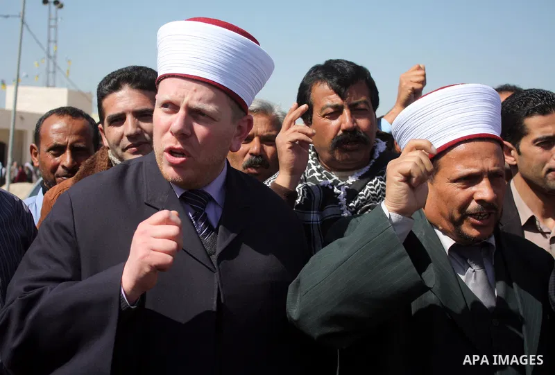 Palestinian take part during demonstration against the decision from Israeli authorities to demolish the mosque ,school and against Israel's controversial separation barrier and calling for the national reconciliation in...
