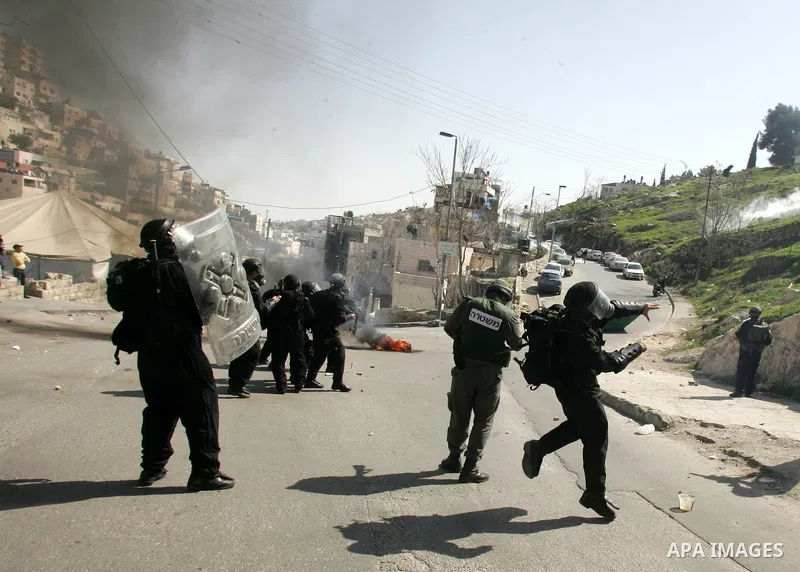 Israeli forces take positions during clashes with Palestinian youths in the east Jerusalem neighborhood of Silwan, Friday, March 4, 2011. Photo by Mahfouz Abu Turk