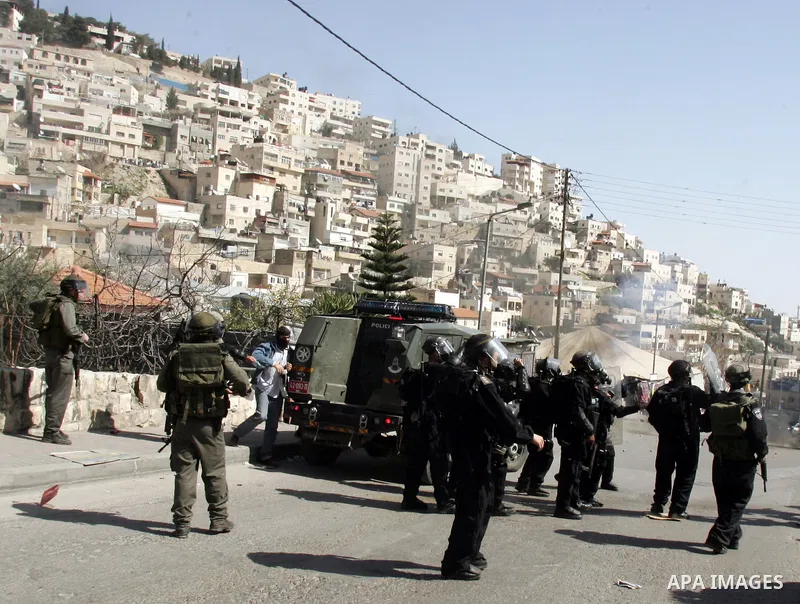 Israeli forces take positions during clashes with Palestinian youths in the east Jerusalem neighborhood of Silwan, Friday, March 4, 2011. Photo by Mahfouz Abu Turk