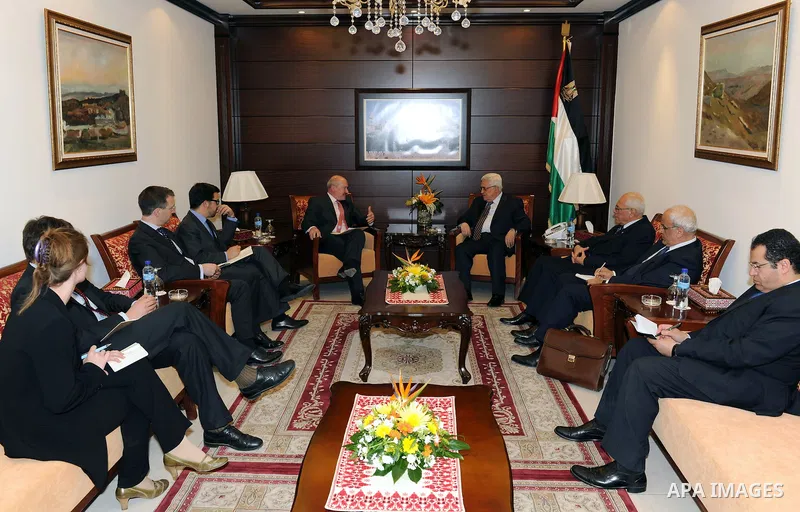 Palestinian President Mahmoud Abbas (Abu Mazen) during a meeting with the French Consul General, Deputy British Consul and Deputy Representative of Germany to the Palestinian Authority in the West Bank city of Ramallah o...