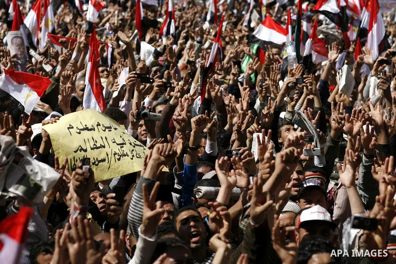 Egyptian protesters attend the Friday demonstration at the Tahrir Square in Cairo, Egypt, Friday, March 4, 2011. Egyptian Prime Minister designate Essam Sharaf vowed before thousands of mostly young demonstrators at the...