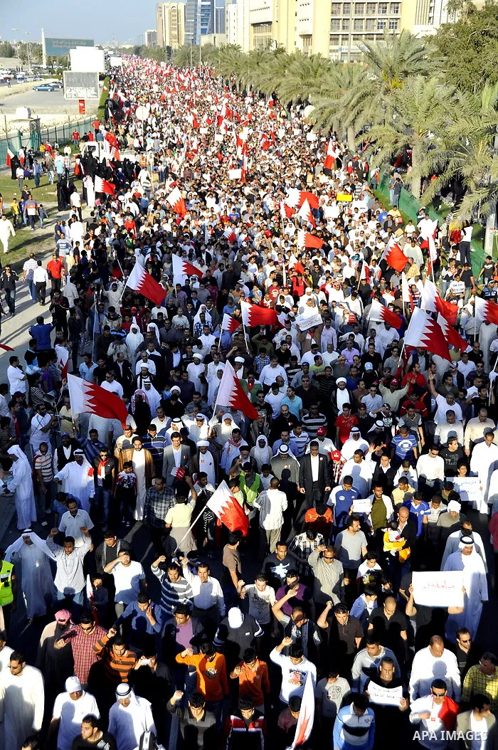 Tens of thousands of Bahraini anti-government protesters march Friday, March 4, 2011, from the main government house in the capital of Manama, Bahrain, to the Pearl roundabout, where they have set up camp. Also on Friday...