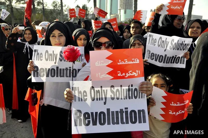 Tens of thousands of Bahraini anti-government protesters march Friday, March 4, 2011, from the main government house in the capital of Manama, Bahrain, to the Pearl roundabout, where they have set up camp. Also on Friday...