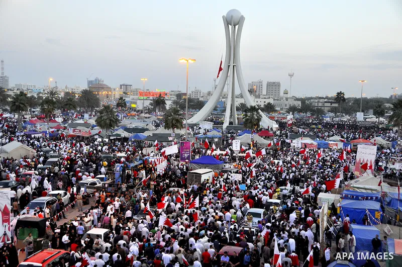 Tens of thousands of Bahraini anti-government protesters march Friday, March 4, 2011, from the main government house in the capital of Manama, Bahrain, to the Pearl roundabout, where they have set up camp. Also on Friday...