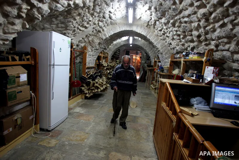Palestinian blind men work in making brooms at a workshop in the Old City of Jerusalem on March 5,2011. The workshop is owned and managed by the Arab Blind Association, which was founded by blind Palestinians in 1932, an...