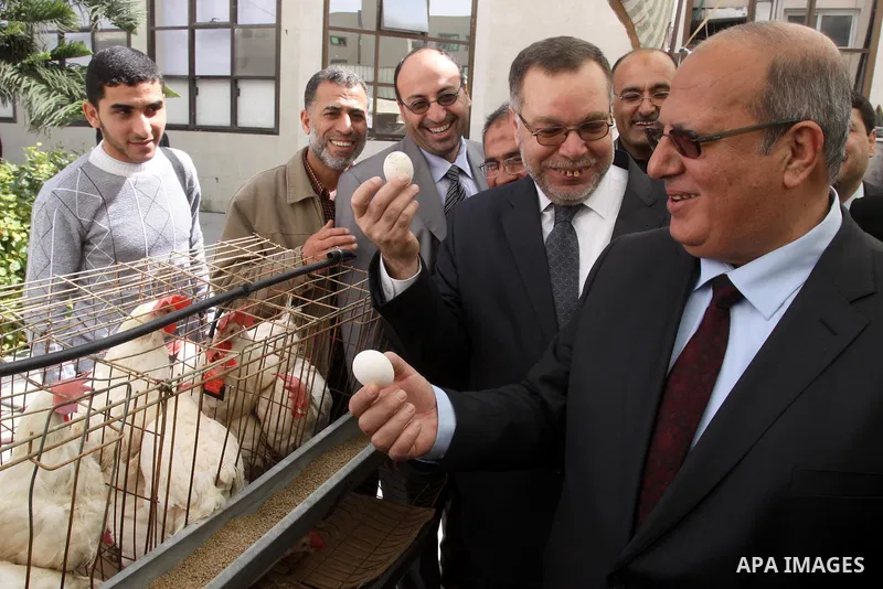 Palestinians participate in the second exhibition for the national agricultural and industrial products at the Islamic University, in Gaza city on March 6,2011. Photo by Mohammed Asad