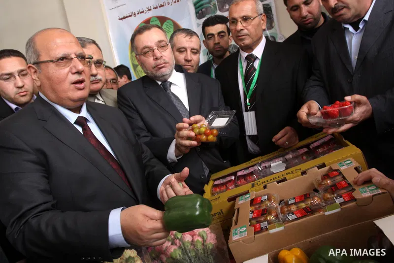 Palestinians participate in the second exhibition for the national agricultural and industrial products at the Islamic University, in Gaza city on March 6,2011. Photo by Mohammed Asad