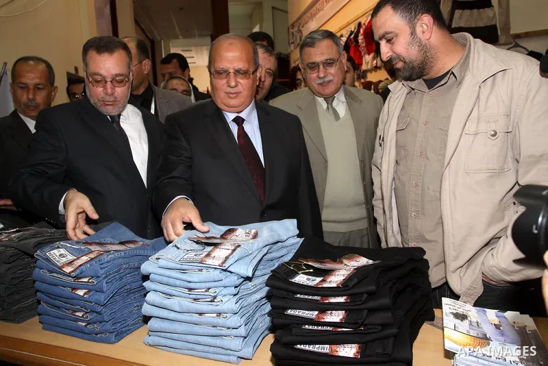 Palestinians participate in the second exhibition for the national agricultural and industrial products at the Islamic University, in Gaza city on March 6,2011. Photo by Mohammed Asad