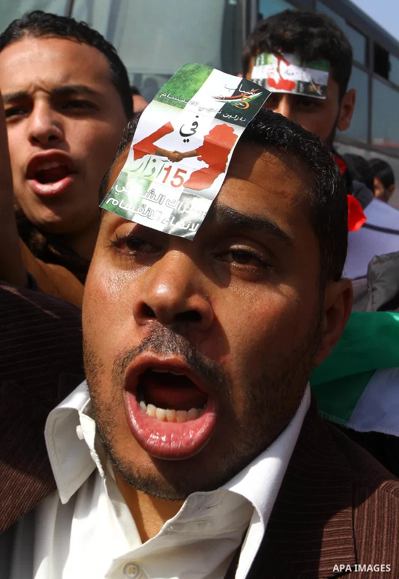 Palestinians shout slogans during a protest in Gaza City calling for unity between the Hamas Islamist group and its bitter West Bank rival Fatah party, on March 7, 2011, a day after Hamas police detained several proteste...