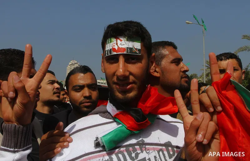 Palestinians shout slogans during a protest in Gaza City calling for unity between the Hamas Islamist group and its bitter West Bank rival Fatah party, on March 7, 2011, a day after Hamas police detained several proteste...