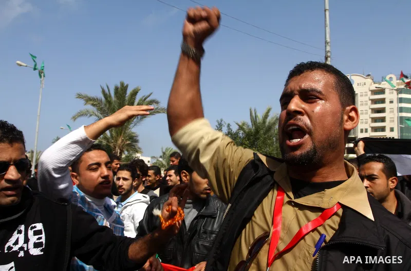 Palestinians shout slogans during a protest in Gaza City calling for unity between the Hamas Islamist group and its bitter West Bank rival Fatah party, on March 7, 2011, a day after Hamas police detained several proteste...
