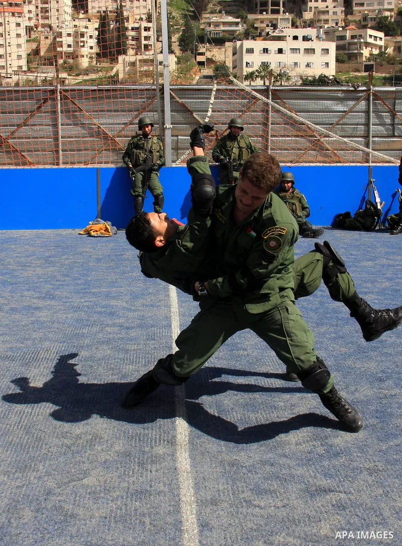 Palestinian security officers take part in a training session in the West Bank city of Nablus, Monday, March 7, 2011 . Photo by Wagdi Eshtayah
