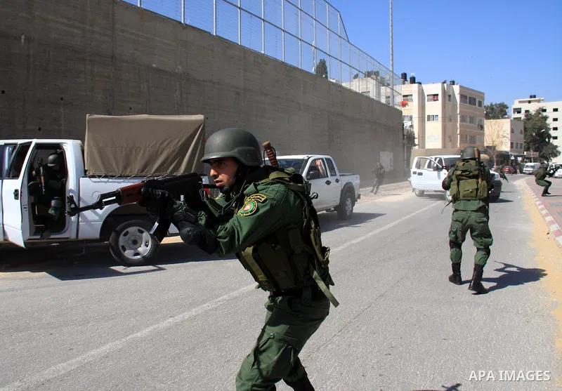 Palestinian security officers take part in a training session in the West Bank city of Nablus, Monday, March 7, 2011 . Photo by Wagdi Eshtayah