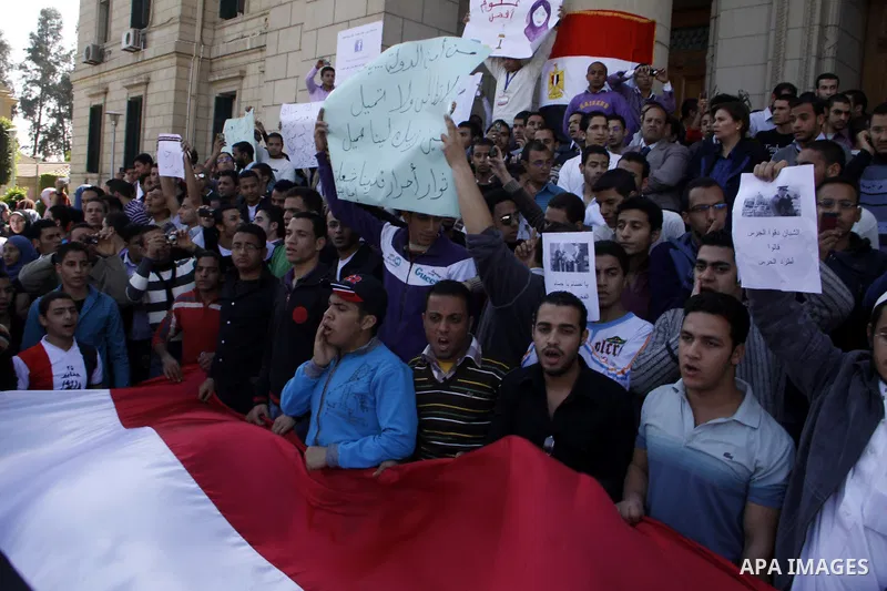Egyptian students take part in a protest inside Cairo University in Cairo, Egypt, March 7, 2011. Photo by Ahmed Asad