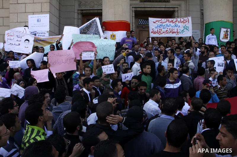 Egyptian students take part in a protest inside Cairo University in Cairo, Egypt, March 7, 2011. Photo by Ahmed Asad