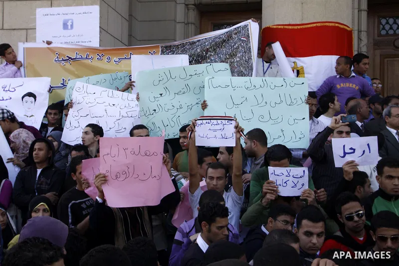 Egyptian students take part in a protest inside Cairo University in Cairo, Egypt, March 7, 2011. Photo by Ahmed Asad