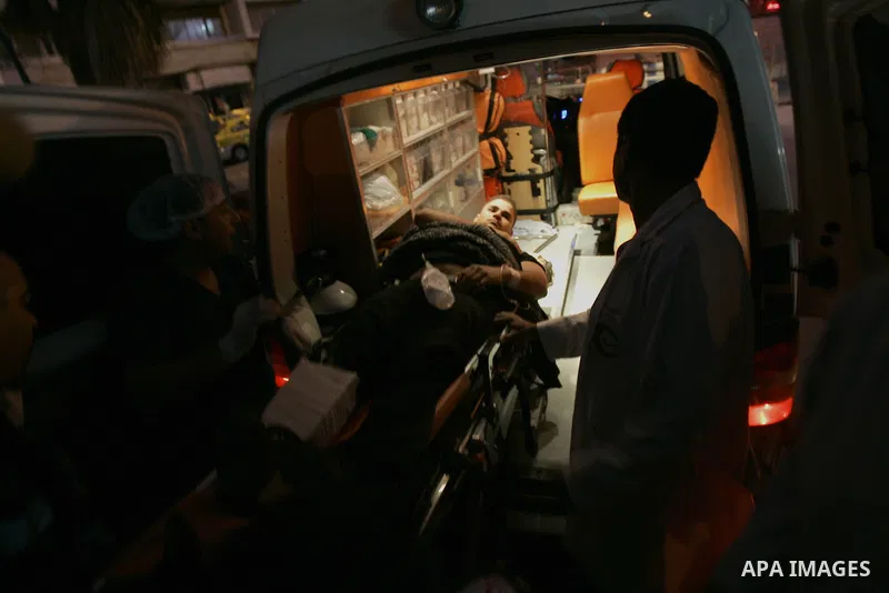 Palestinian doctors attend to a wounded youth at a hospital after being shot by a group of Jewish settlers in the village of his palace in the West Bank near Nablus March 7, 2011 , Jewish settlers and wounded 10 Palestin...