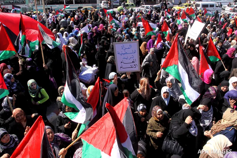 Palestinian women attend a rally calling for an end to Palestinian divisions, to mark International Women's Day in Gaza City March 8, 2011. Female protesters rallied to voice their frustrations over the unending split be...