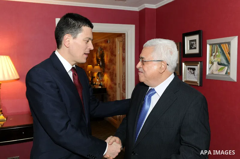 Palestinian President Mahmoud Abbas (Abu Mazen) during a meeting with the former British Foreign Secretary, David Miliband in the West Bank city of Ramallah on March 7, 2011. Photo by Thaer Ganaim