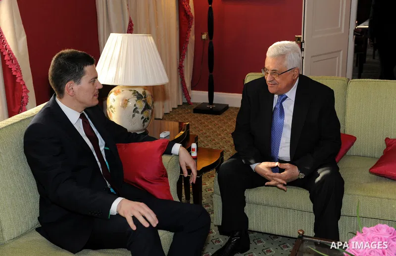 Palestinian President Mahmoud Abbas (Abu Mazen) during a meeting with the former British Foreign Secretary, David Miliband in the West Bank city of Ramallah on March 7, 2011. Photo by Thaer Ganaim
