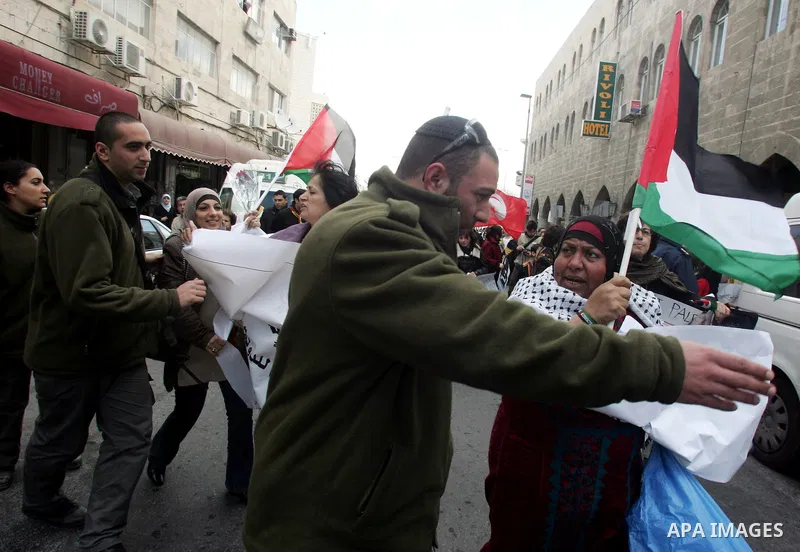 Palestinian women demonstrate against Israel during a women's day protest at Damascus Gate in Jerusalem's Old City on March 8,2011. Photo by Mahfouz Abu Turk