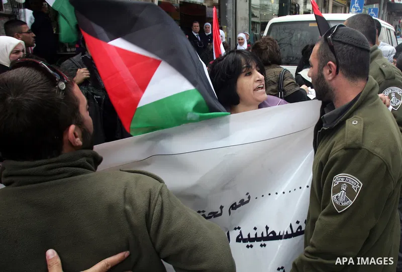 Palestinian women demonstrate against Israel during a women's day protest at Damascus Gate in Jerusalem's Old City on March 8,2011. Photo by Mahfouz Abu Turk