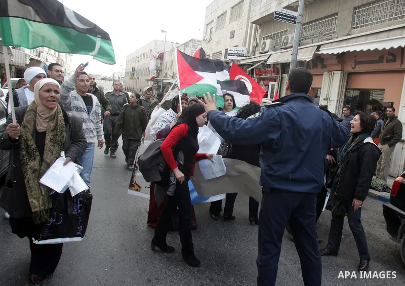 Palestinian women demonstrate against Israel during a women's day protest at Damascus Gate in Jerusalem's Old City on March 8,2011. Photo by Mahfouz Abu Turk