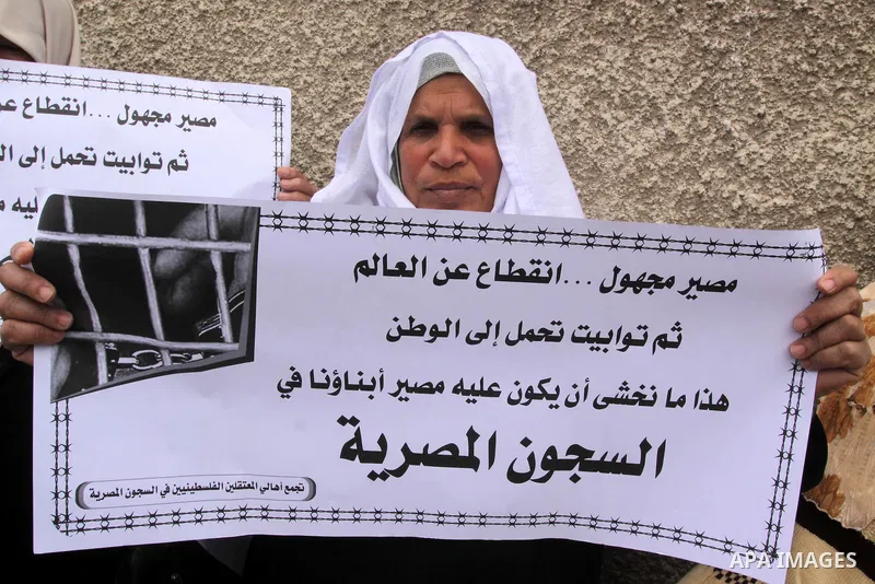 Palestinian jailed relatives take part in a protest calling for the release of Palestinian prisoners from Egyptian jails in front of the Egyptian Embassy in Gaza City on March 9,2011. Photo by Mohammed Asad