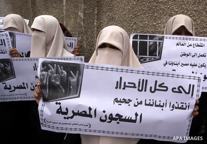 Palestinian jailed relatives take part in a protest calling for the release of Palestinian prisoners from Egyptian jails in front of the Egyptian Embassy in Gaza City on March 9,2011. Photo by Mohammed Asad