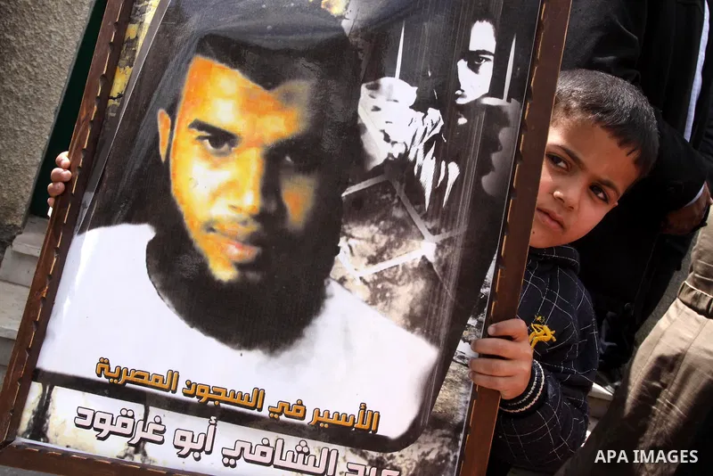 Palestinian jailed relatives take part in a protest calling for the release of Palestinian prisoners from Egyptian jails in front of the Egyptian Embassy in Gaza City on March 9,2011. Photo by Mohammed Asad