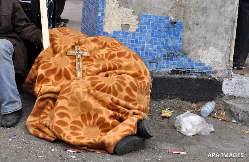 Egyptian Coptic Christians take part in a protest in front of the Information center building in Cairo, Egypt, 09 March 2011. The Coptic Christians were protesting over the burning of a church in Cairo suburbs on 04 Marc...
