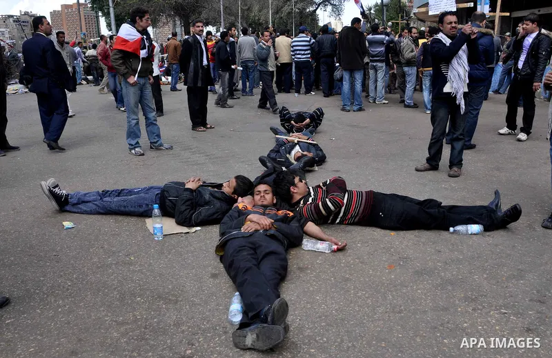 Egyptian Coptic Christians take part in a protest in front of the Information center building in Cairo, Egypt, 09 March 2011. The Coptic Christians were protesting over the burning of a church in Cairo suburbs on 04 Marc...