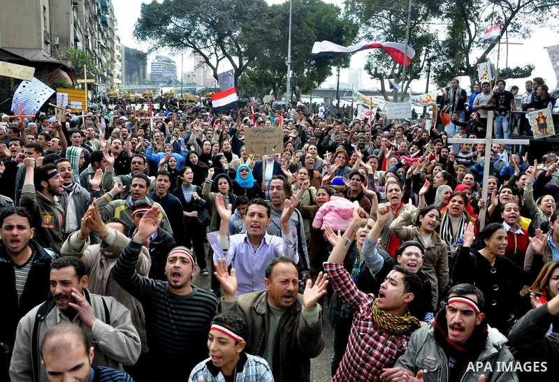 Egyptian Coptic Christians take part in a protest in front of the Information center building in Cairo, Egypt, 09 March 2011. The Coptic Christians were protesting over the burning of a church in Cairo suburbs on 04 Marc...