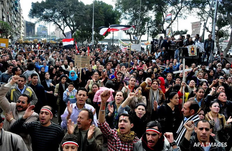 Egyptian Coptic Christians take part in a protest in front of the Information center building in Cairo, Egypt, 09 March 2011. The Coptic Christians were protesting over the burning of a church in Cairo suburbs on 04 Marc...