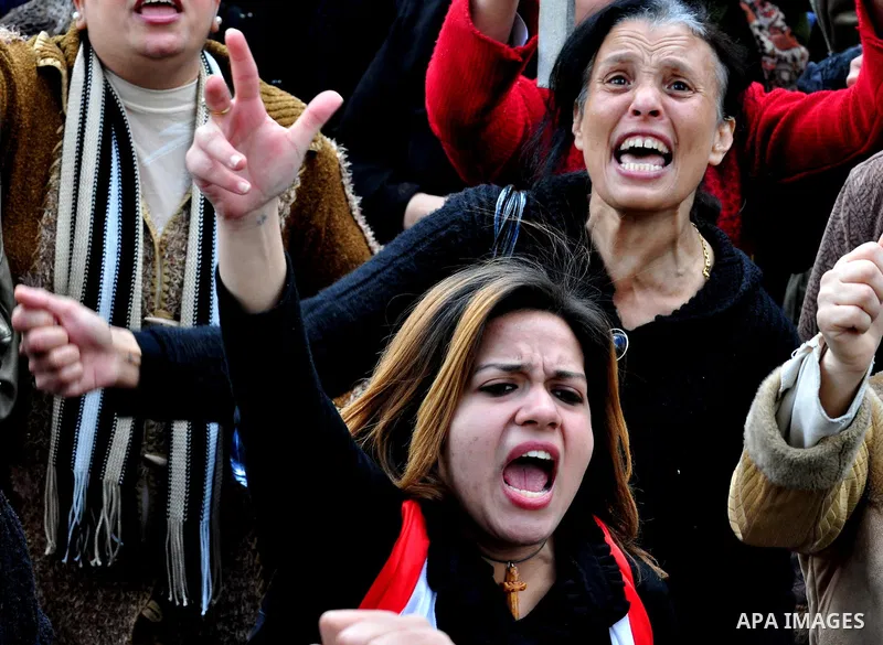 Egyptian Coptic Christians take part in a protest in front of the Information center building in Cairo, Egypt, 09 March 2011. The Coptic Christians were protesting over the burning of a church in Cairo suburbs on 04 Marc...