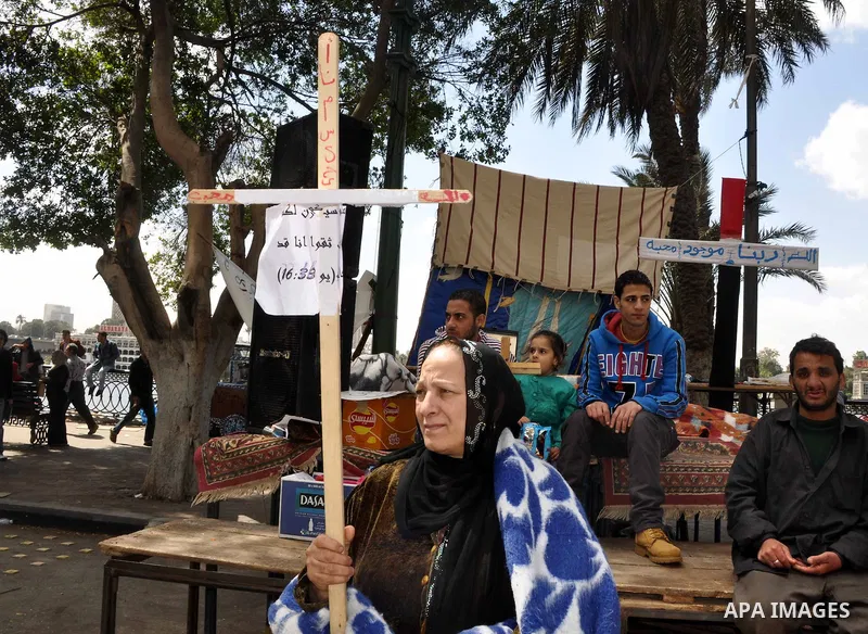 Egyptian Coptic Christians take part in a protest in front of the Information center building in Cairo, Egypt, 09 March 2011. The Coptic Christians were protesting over the burning of a church in Cairo suburbs on 04 Marc...